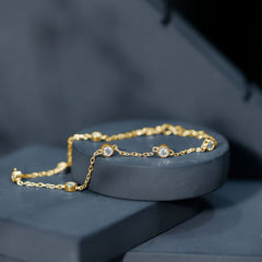 Round Cut Certified Moissanite Chain Bracelet in Bezel Setting