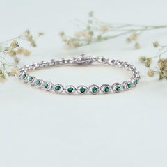 Lab Created Emerald Tennis Bracelet in Bezel Setting