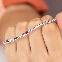 Oval Lab Grown Ruby Link Bracelet with Moissanite