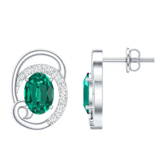 Oval Shaped 1.7 Carat Lab Grown Emerald Designer Earrings in Sterling Silver