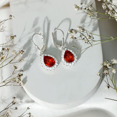 5 Carat Lab Grown Orange Sapphire Teardrop Earrings With Moissanite Halo Accents