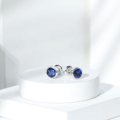 2 Carat Round Lab Created Blue Sapphire Stud Earrings in Bezel Setting