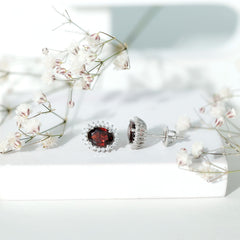 Sterling Silver 3 Carat Oval Garnet Stud Earrings with Moissanite Halo