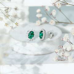 Lab Created Emerald Oval Stud Earrings with Moissanite Halo