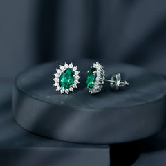 Lab Created Emerald Oval Stud Earrings with Moissanite Halo