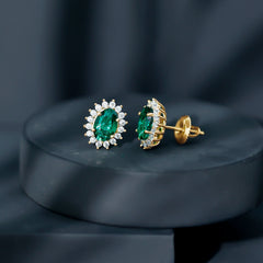 Lab Created Emerald Oval Stud Earrings with Moissanite Halo
