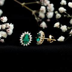 Lab Created Emerald Oval Stud Earrings with Moissanite Halo
