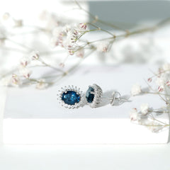 Oval Shaped 2.2 Carat London Blue Topaz Stud Earrings with Moissanite Halo