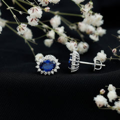 Lab Created Blue Sapphire Oval Stud Earrings with Moissanite Halo