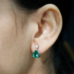 Pear Cut Created Emerald Teardrop Earrings with Moissanite