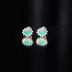 Natural 0.8 Carat Oval Cut Emerald and Diamond Earrings