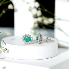 Natural 0.8 Carat Oval Cut Emerald and Diamond Earrings
