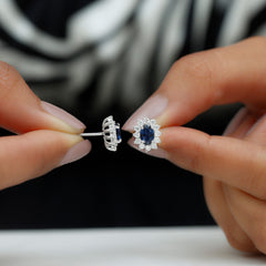 Oval Shaped Lab Grown Blue Sapphire and Diamond Halo Stud Earrings