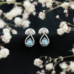 Genuine 0.5 Carat Aquamarine Infinity Stud Earrings