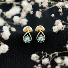 Genuine 0.5 Carat Aquamarine Infinity Stud Earrings