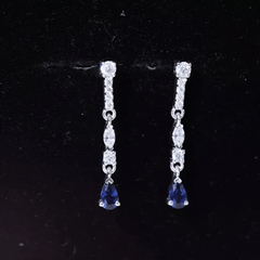 Pear Cut Created Blue Sapphire and Moissanite Long Dangle Earrings