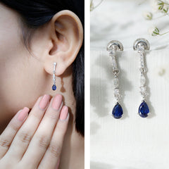 Pear Cut Created Blue Sapphire and Moissanite Long Dangle Earrings