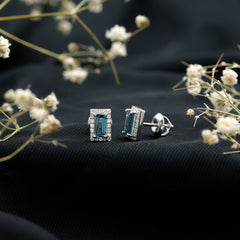Natural Half Carat Baguette London Blue Topaz Stud Earrings with Diamond Halo