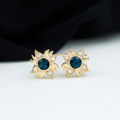 London Blue Topaz and Diamond Sunburst Stud Earrings