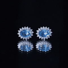 1.6 Carat Oval London Blue Topaz Stud Earrings with Diamond Halo