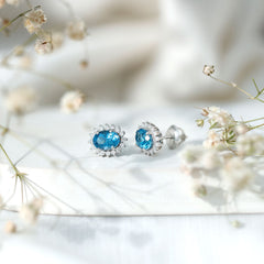 1.6 Carat Oval London Blue Topaz Stud Earrings with Diamond Halo