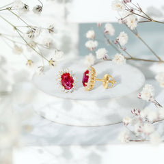 Oval Shaped Lab Created Ruby and Diamond Halo Stud Earrings