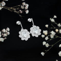 Bezel Set 2.5 Carat Oval Moissanite Flower Drop Earrings