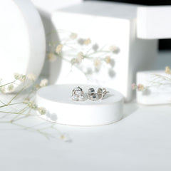 Bezel Set Round Cut Moissanite Three Stone Stud Earrings