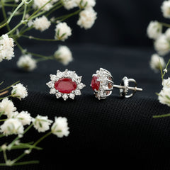 Genuine Oval Cut Ruby and Diamond Halo Stud Earrings