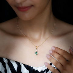 Natural 0.7 Carat Emerald Infinity Pendant Necklace with Diamond