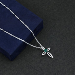 Pear Cut Emerald Cross Pendant With Lab Grown Diamond
