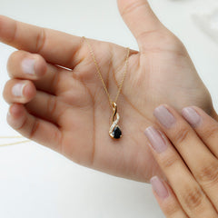 Pear Shape Black Onyx Infinity Pendant Necklace with Moissanite Accent