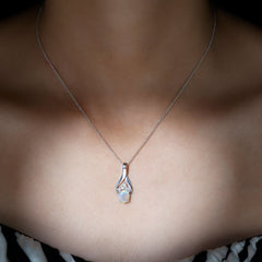 1.2 Carat Oval Ethiopian Opal Teardrop Pendant in Silver