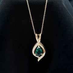 Pear Cut Created Emerald Teardrop Pendant with Moissanite