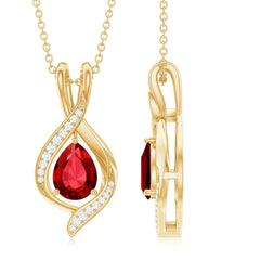 Pear Cut Created Ruby Teardrop Pendant with Moissanite Accent