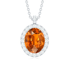 Oval Created Orange Sapphire and Diamond Halo Pendant