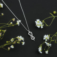 Minimal Moissanite Infinity Knot Pendant Necklace