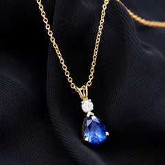 Lab Created Blue Sapphire Teardrop Necklace with Moissanite