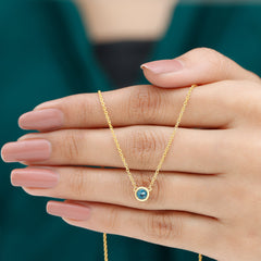0.6 Carat Round London Blue Topaz Solitaire Necklace in Bezel Setting