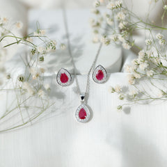 Genuine 2.6 Carat Pear Cut Ruby and Moissanite Halo Pendant and Earrings Set