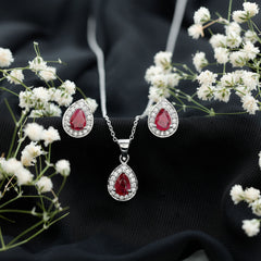Genuine 2.6 Carat Pear Cut Ruby and Moissanite Halo Pendant and Earrings Set