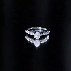 Solitaire Moissanite Teardrop Engagement Ring with Surprise Band