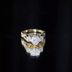 Heart Moissanite 3 Stone Engagement Ring in Crossover Band