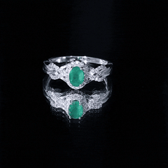 Designer Emerald Oval Engagement Ring with Diamond Halo