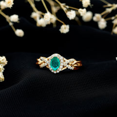 Designer Emerald Oval Engagement Ring with Diamond Halo