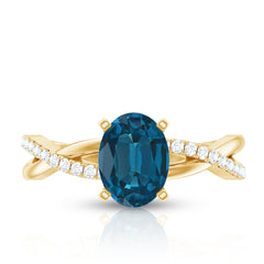 6X8mm Oval Cut London Blue Topaz Solitaire Engagement Ring with Diamond Spiral Shank