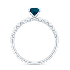 6X8mm Oval Cut London Blue Topaz Solitaire Engagement Ring with Diamond Side Stones