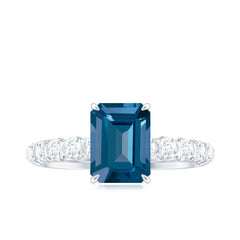 6X8mm Emerald Cut London Blue Topaz Engagement Ring with Diamond Side Stones