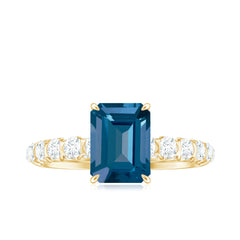 6X8mm Emerald Cut London Blue Topaz Engagement Ring with Diamond Side Stones