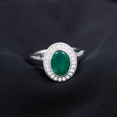 6X8 mm Oval Lab Grown Emerald Bezel Set Engagement Ring With Diamond Halo